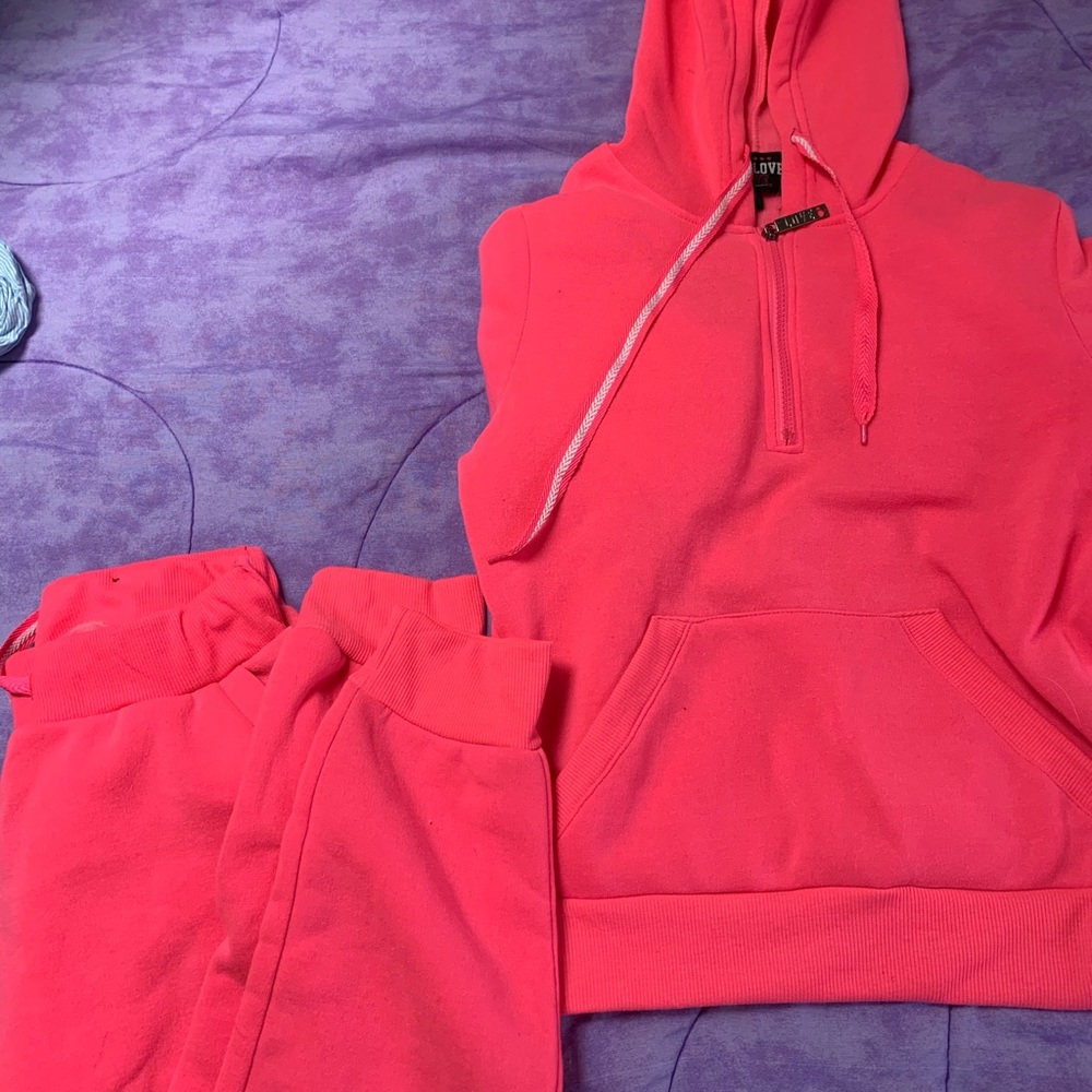 bright pink sweatsuit